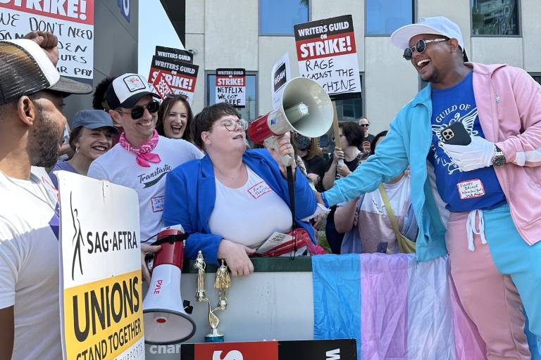 8 queer people and groups on the picket line in 2023